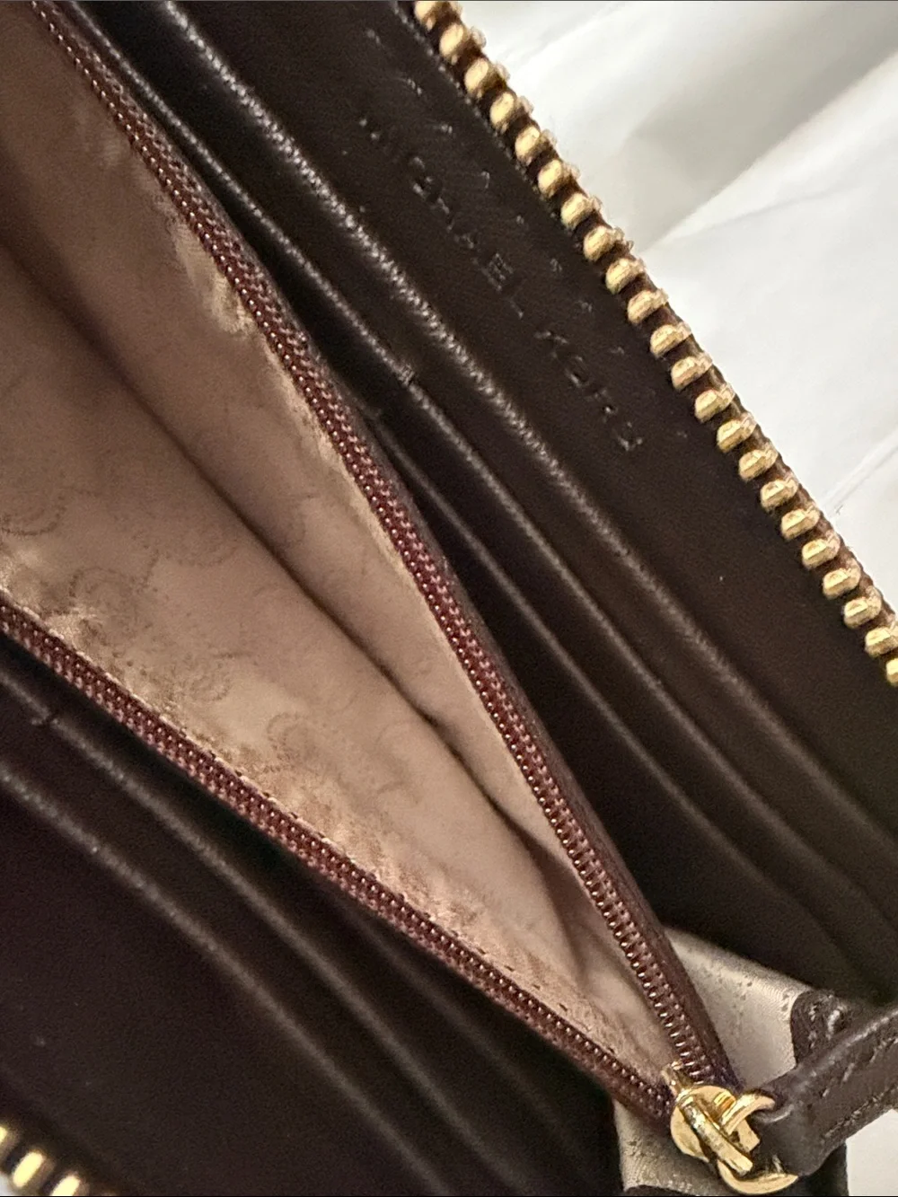 Michael Kors Dark Brown Signature Zip Wallet with Gold Plate